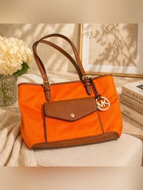 Michael Kors "Jet Set" Large Pocket Multifunction Nylon Tote" in Orange